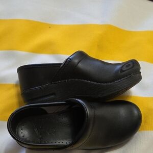 Dansko Black Slip-On Clog Sole with Embossed Logo